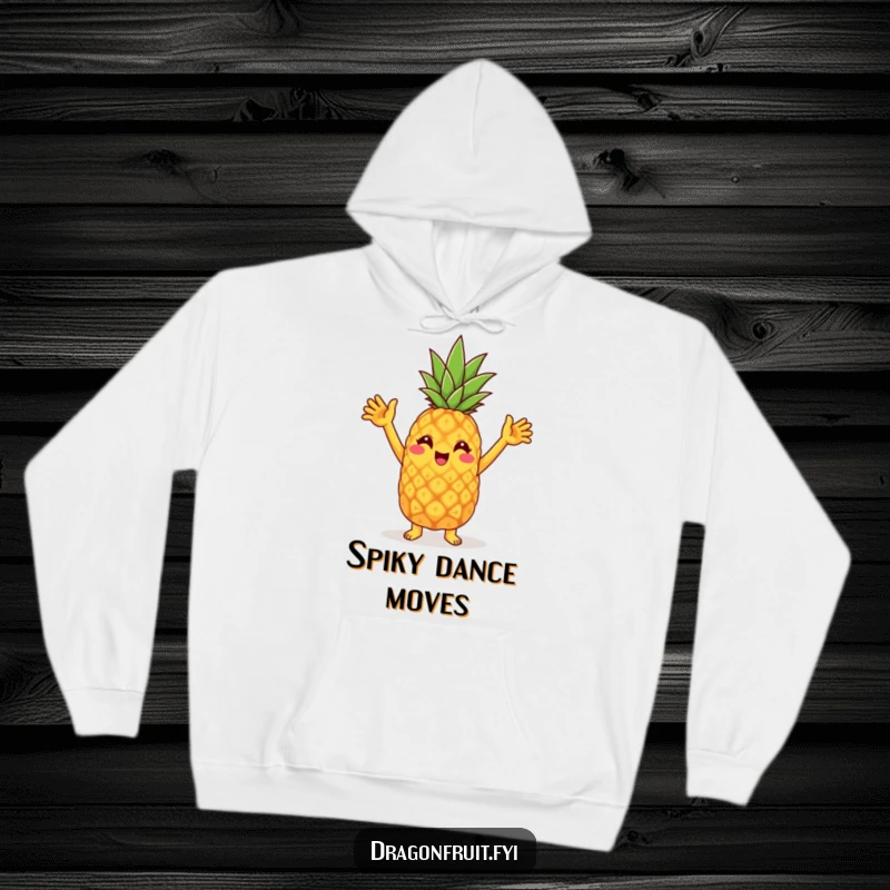 Funny hoodie featuring a cheerful pineapple character doing a silly dance with arms thrown up in the air.