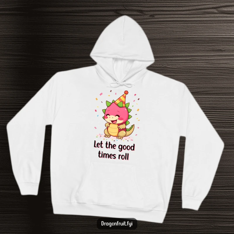 Funny hoodie featuring a giggling dragonfruit wearing a party hat with confetti falling, for cozy, festive moments.