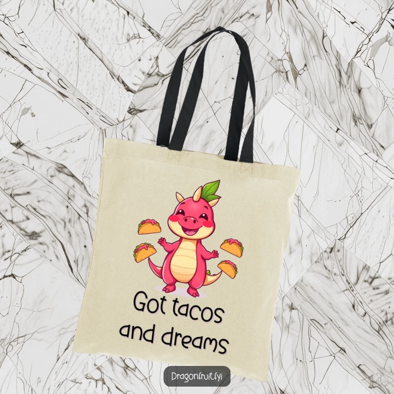 Funny tote bag illustrated with a smiling dragonfruit character juggling three small, energetic dancing tacos, ideal for market trips.