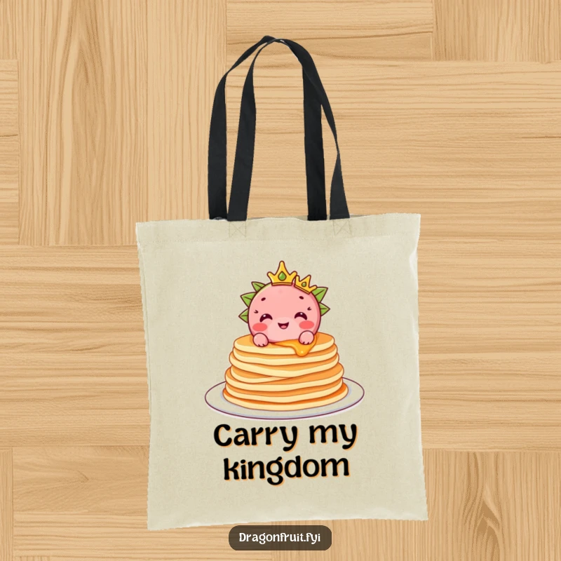Funny Dragonfruit Tote Bag: Features a crowned dragonfruit character atop pancakes, perfect for carrying breakfast treasures with style.